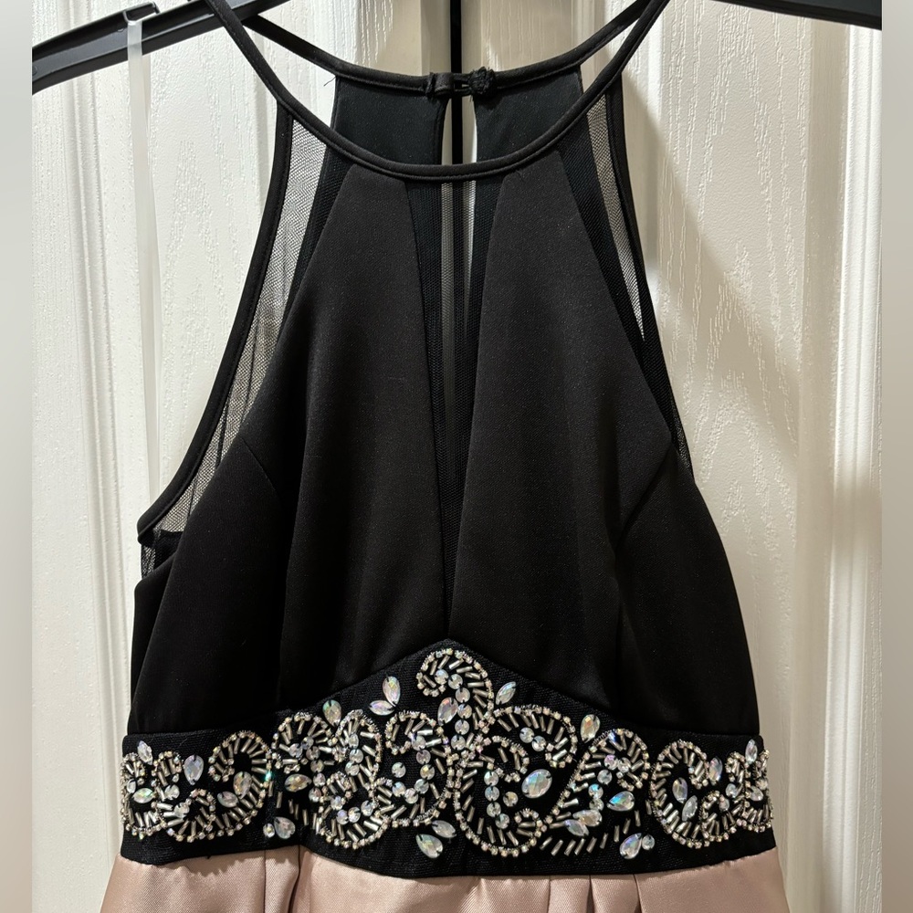 Nights by Teeze Me,  size 3  black and cream floor length with pockets.